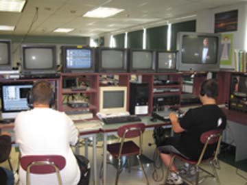 Ludlow High Schools Eye of the Lion TV Studio students work in the news room to produce a morning announcement show.