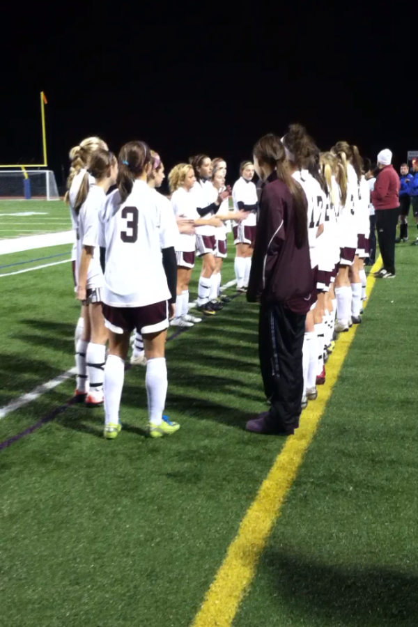 The Lady Lions line up for the starting line-up 