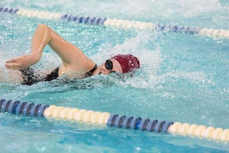 Junior Hannah Bryan-Nelson swimming freestyle. 