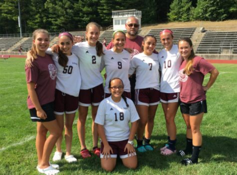 Sophomore Jade Blake, left, poses with Junior Varsity A team.