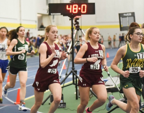 LHS runners Savanna (left) and Brianna Charow complete on the LHS track team.