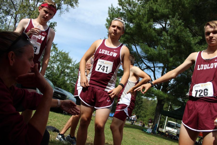 Coach Gauvin giving her runners last minute advice and encouragement