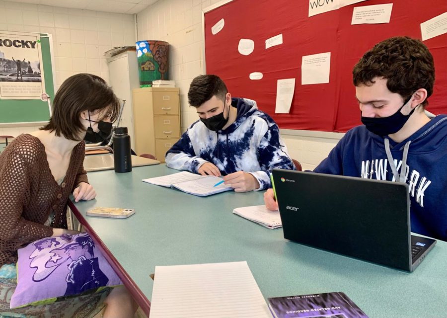 Seniors Mackenzie Murphy, Ryan Colson, and Leo Laguerre may be able to shed their masks in class on Feb. 28