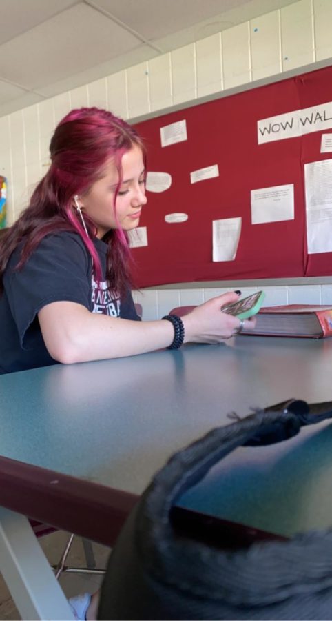 Junior Mikala Stefanelli says she has little self control when it comes to her cellphone,